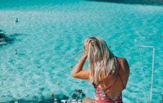 Girl overlooking the blue lagoon