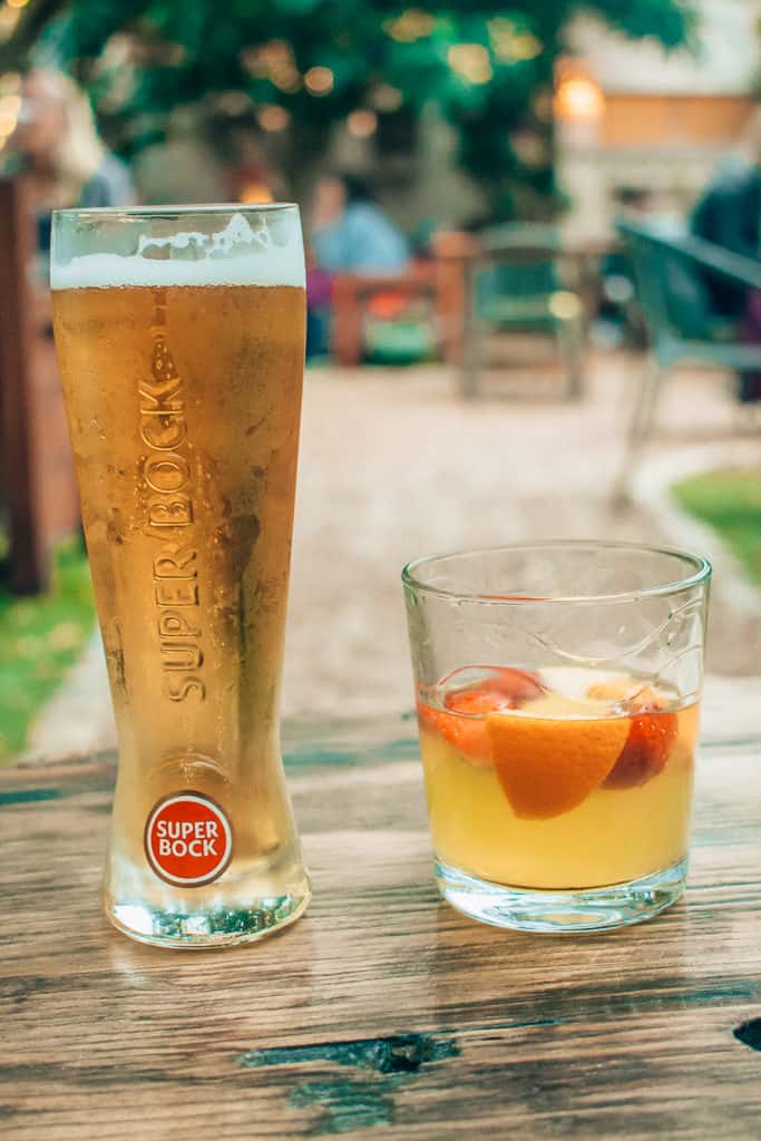 a beer and sangria placed on a table