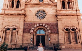 girl standing in front of Cathedral