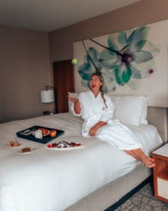 girl on hotel bed