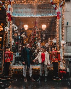 couple in front of shop