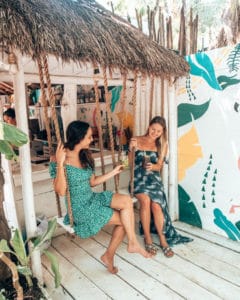2 girls on swings